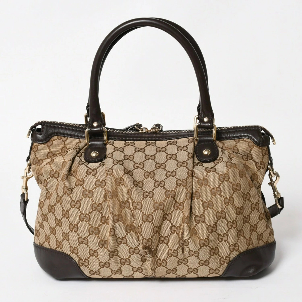Gucci GG Canvas Sukey Zip Handbag beige brown GG brown leather